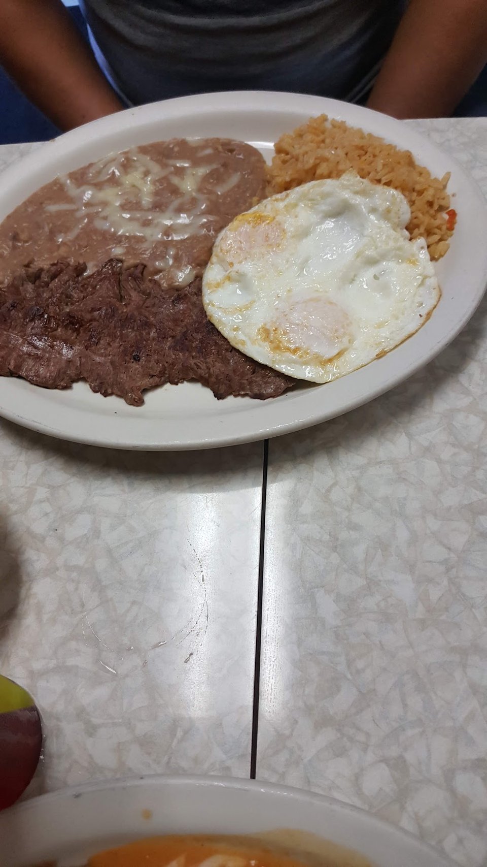 Menu layout with seafood, burritos, and breakfast items.